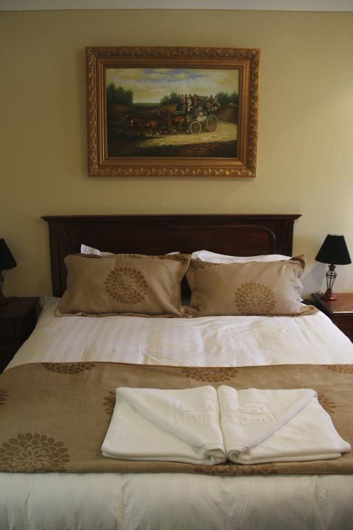 Overlander Homestead Motel Roma Habitación foto