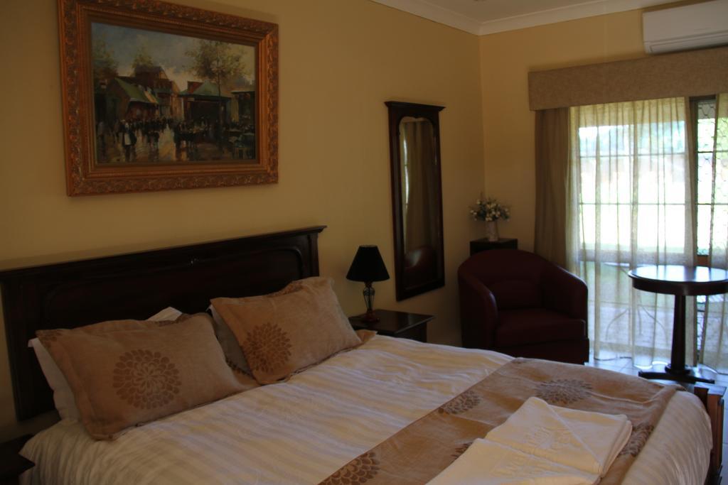 Overlander Homestead Motel Roma Habitación foto